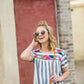 women's modest blue and white striped top with embroidered flowers