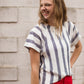 blue and white striped knit top