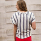 blue and white striped knit top