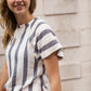 blue and white striped knit top