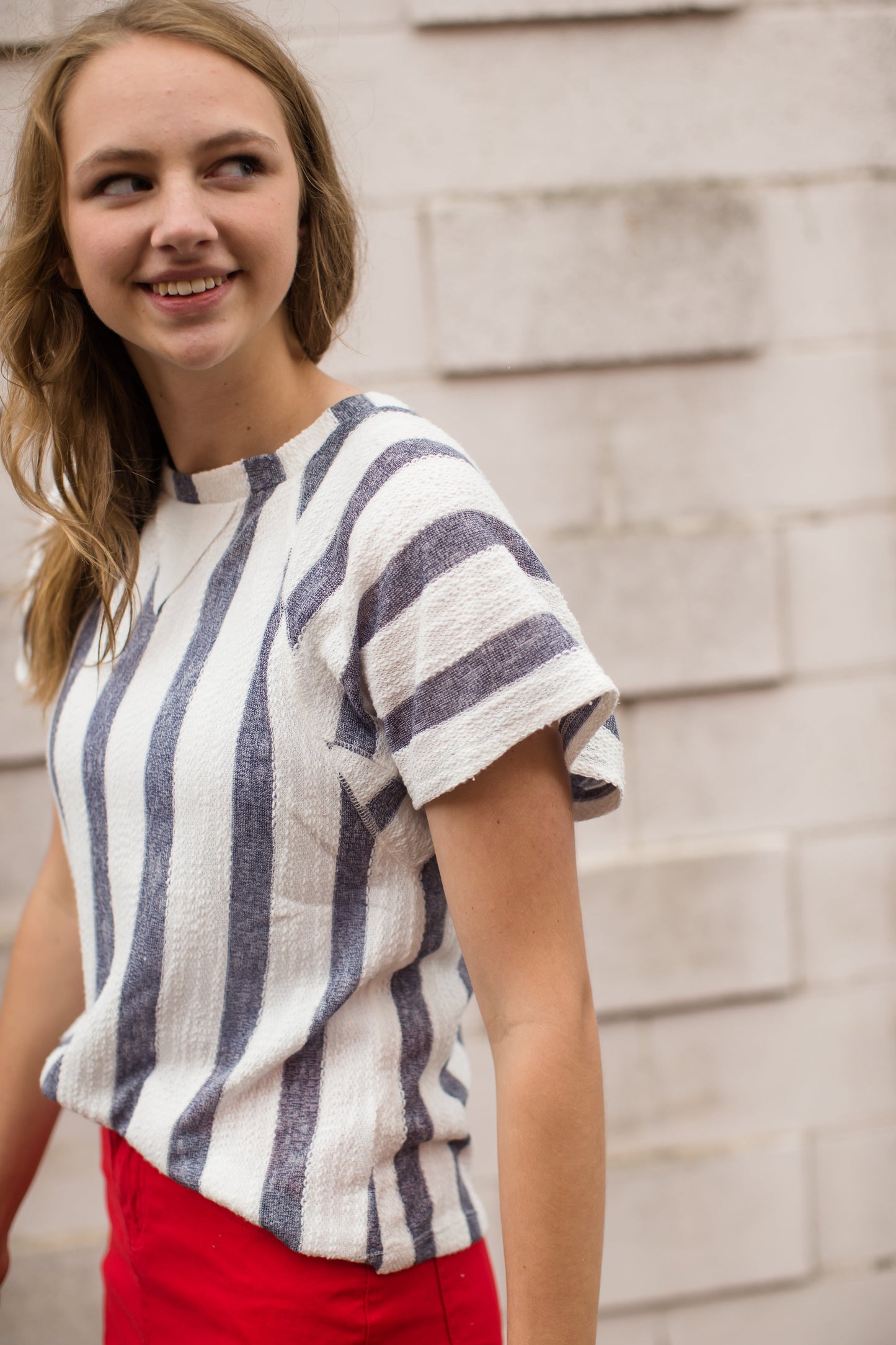 blue and white striped knit top