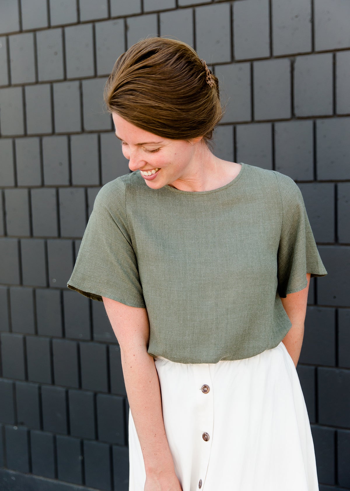 Olive blouse with a button detail