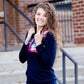 This half zip pullover features a front pouch pocket and a beautiful color block print of fuchsia, teal and mustard! It also is a mommy and me style.  