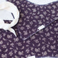 This is a purple and floral baby burp cloth, baby bandana and headband gift set.