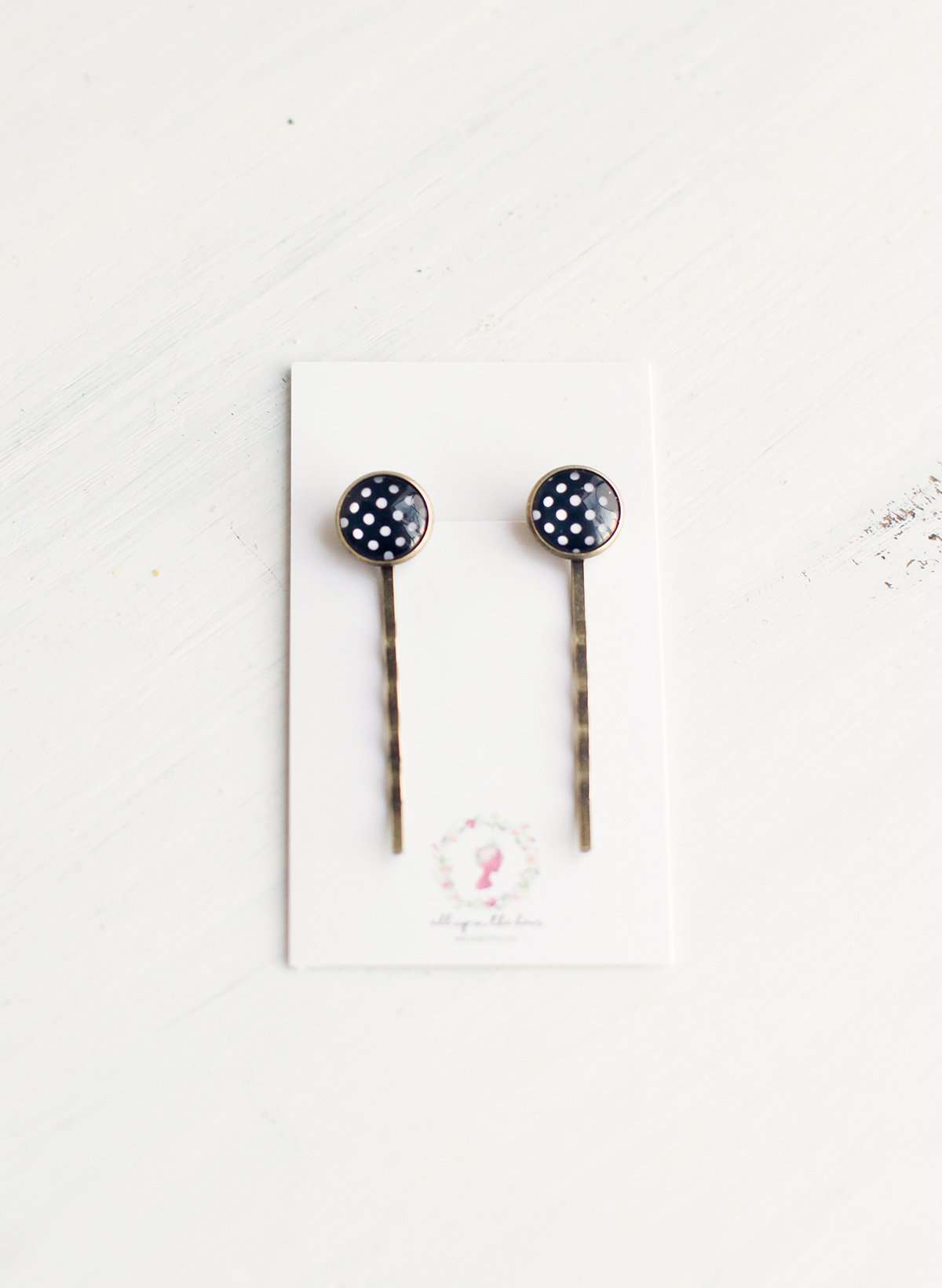 Black and White Polka Dot Bobby Pins on a gold post
