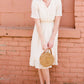 pom pom textured white modest midi dress
