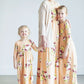 young girl wearing a modest mint and floral maxi dress