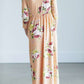 young girl wearing a modest mint and floral maxi dress