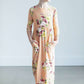 young girl wearing a modest mint and floral maxi dress