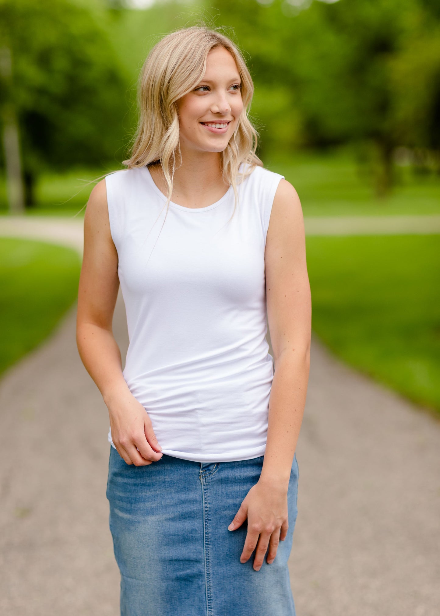 Premium Basic Layering Tank Top Tops White / SA stretchy layering tank with thick straps and a modest round neckline. Comes in three colors black, white, and navy.