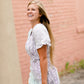 Cream and black side tie midi dress