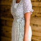 Cream and black side tie midi dress