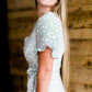 Cream and black side tie midi dress