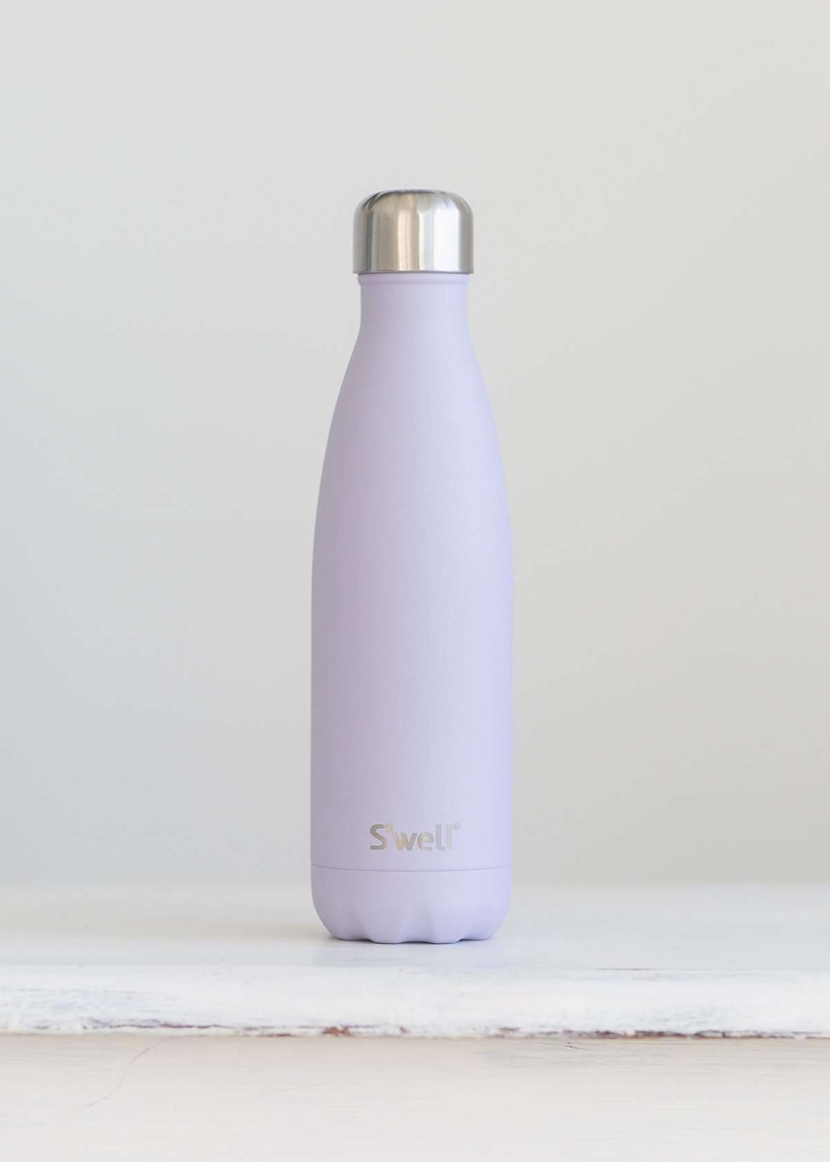 S'well water bottle in a purple garnet design and holds 16 oz.
