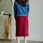This is the quinn knit midi skirt that is made of high quality knit with a stretch waistband and is in a streight fit.