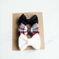 Little girls hair bow set of three. This shows a white, black and red plaid headband or alligator clip bow.