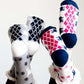 Reindeer Christmas scene slipper socks in gray, cream and black.