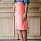 modest coral colored denim midi skirt