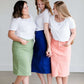 modest coral colored denim midi skirt