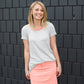 modest coral colored denim midi skirt