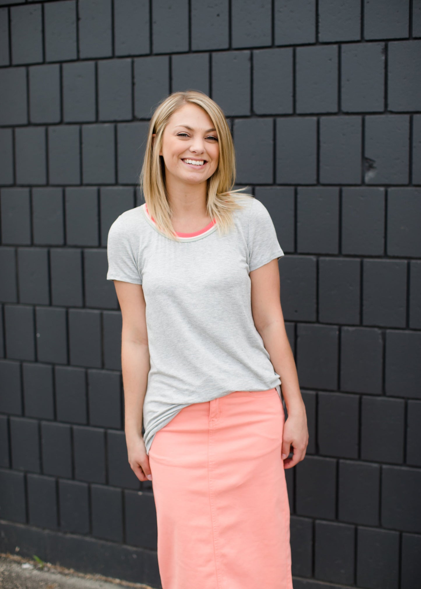 modest coral colored denim midi skirt