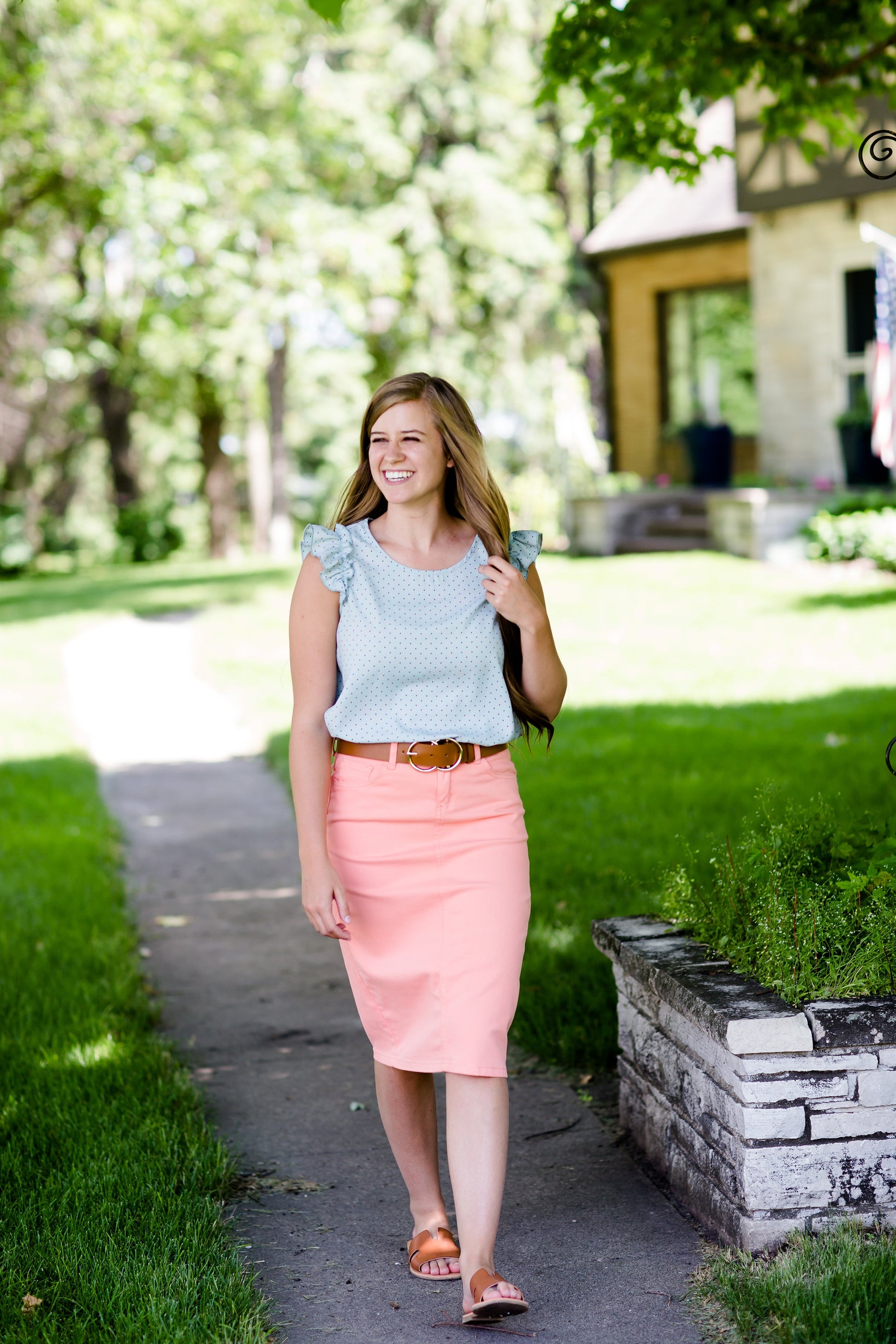 modest coral colored denim midi skirt