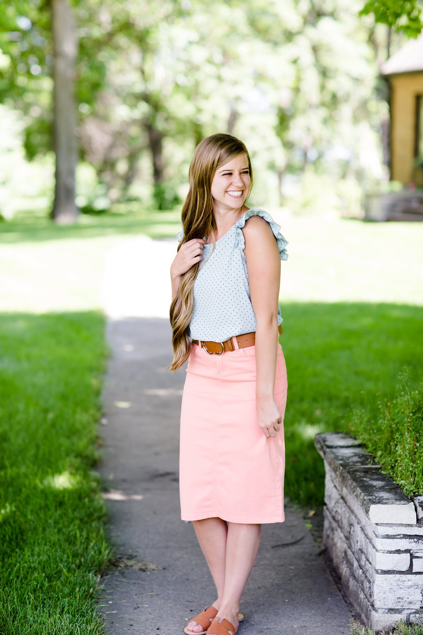 modest coral colored denim midi skirt