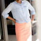 modest coral colored denim midi skirt