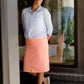 modest coral colored denim midi skirt