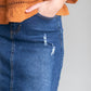 An Inherit Exclusive, the Remi Raw Hem Dark Denim Midi Skirt is cut with a modest and classic straight fit. This dark denim skirt has a raw bottom hem and will be a go-to time and time again for any occasion! The slight distressing at the hip adds fun style to your closet without any thought at being dressy or casual as it is definitely both! This skirt has awesome stretch for total comfort and no back slit while still allowing for unconstrained walking.