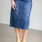 An Inherit Exclusive, the Remi Raw Hem Dark Denim Midi Skirt is cut with a modest and classic straight fit. This dark denim skirt has a raw bottom hem and will be a go-to time and time again for any occasion! The slight distressing at the hip adds fun style to your closet without any thought at being dressy or casual as it is definitely both! This skirt has awesome stretch for total comfort and no back slit while still allowing for unconstrained walking.