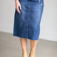 An Inherit Exclusive, the Remi Raw Hem Dark Denim Midi Skirt is cut with a modest and classic straight fit. This dark denim skirt has a raw bottom hem and will be a go-to time and time again for any occasion! The slight distressing at the hip adds fun style to your closet without any thought at being dressy or casual as it is definitely both! This skirt has awesome stretch for total comfort and no back slit while still allowing for unconstrained walking.