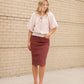This Remi is a straight fit skirt that is a fan favorite Inherit Design. This rosewood color is gorgeous and will go with all the things. It comes in sizes 26" + 29" lengths with a slit in the back for walkability.