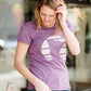 Mauve and Olive Minnesota screen printed tee shirt. These shirts are worn by a model standing in front of Inherit Clothing Company.