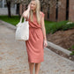 Your favorite dress is back in a brand new color! The Sami Terracotta Knit Midi Dress from our Inherit Name-sake label is the best dress for so many reasons. It drapes beautifully and feels casual, but looks so refined and feminine. The soft fabric has a bit of stretch and the sleeve length is very flattering. Tie waist for customizable fit and did we mention it has pockets?