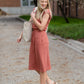Your favorite dress is back in a brand new color! The Sami Terracotta Knit Midi Dress from our Inherit Name-sake label is the best dress for so many reasons. It drapes beautifully and feels casual, but looks so refined and feminine. The soft fabric has a bit of stretch and the sleeve length is very flattering. Tie waist for customizable fit and did we mention it has pockets?