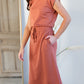 Your favorite dress is back in a brand new color! The Sami Terracotta Knit Midi Dress from our Inherit Name-sake label is the best dress for so many reasons. It drapes beautifully and feels casual, but looks so refined and feminine. The soft fabric has a bit of stretch and the sleeve length is very flattering. Tie waist for customizable fit and did we mention it has pockets?