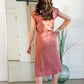 Your favorite dress is back in a brand new color! The Sami Terracotta Knit Midi Dress from our Inherit Name-sake label is the best dress for so many reasons. It drapes beautifully and feels casual, but looks so refined and feminine. The soft fabric has a bit of stretch and the sleeve length is very flattering. Tie waist for customizable fit and did we mention it has pockets?