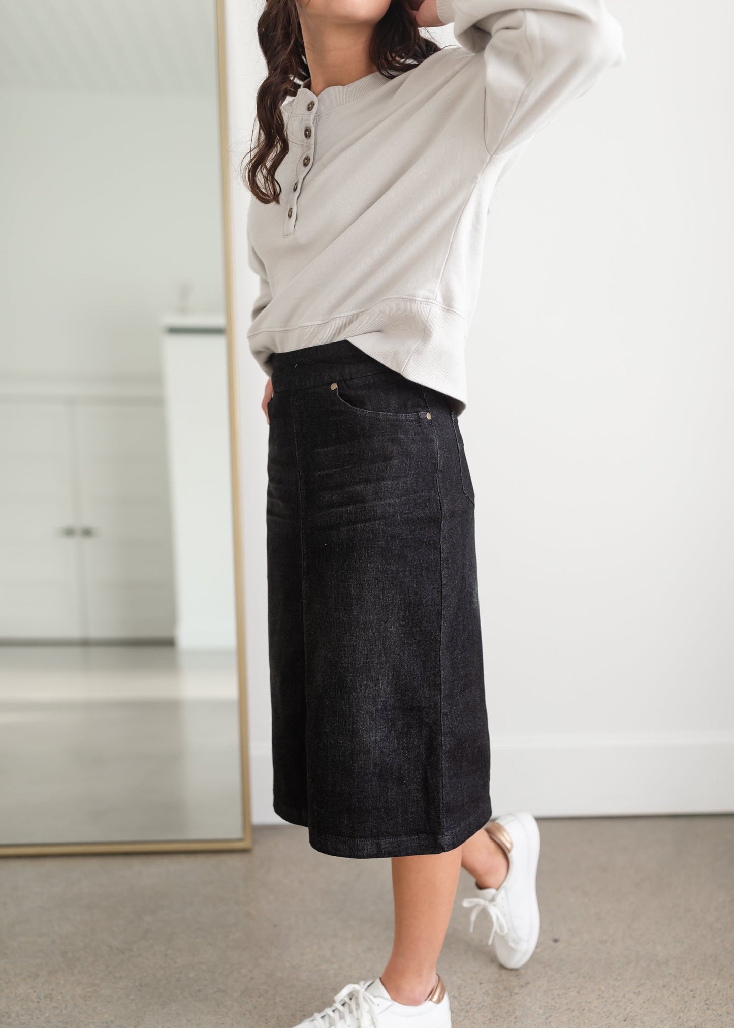 Sandra Black Midi Skirt Inherit Co. Sandra Black Midi Skirt Inherit Co. is a pull on stretch denim in black wash.