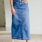 The Stacy skirt is long denim with a raw hem and slight monkey washing in a medium wash. This is an inherit designed long denim mdest skirt.