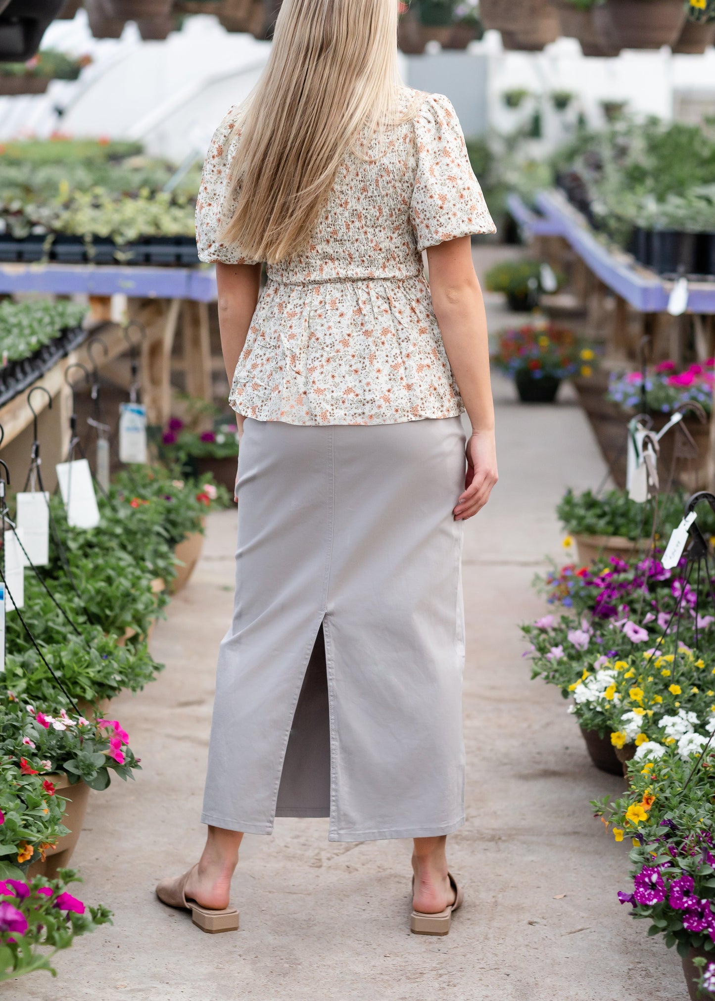 This Inherit original is classic + simple. The Stella Stone Gray Long Denim Maxi Skirt is a wardrobe staple, and one of our best sellers, we're so happy it is back! The moss olive long denim is accented by stitching and the pockets include a simple and elegant design. The straight and simple style is graced with a back slit below the knees for easy walking. No details were missed with this skirt!