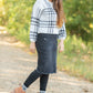 Crafted from a cotton blend, this Zoey Frayed Hem Black Denim Midi Skirt is an Inherit Design you'll be reaching for again and again! This skirt has an on-trend, yet classic style to it. There is slight distressing and the raw hem is the perfect finishing touch!