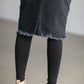 Crafted from a cotton blend, this Zoey Frayed Hem Black Denim Midi Skirt is an Inherit Design you'll be reaching for again and again! This skirt has an on-trend, yet classic style to it. There is slight distressing and the raw hem is the perfect finishing touch!